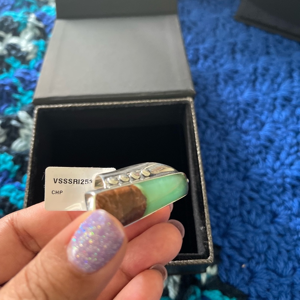 Chrysoprase is one of the birthstones for May . Sterling silver